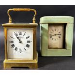 A brass carriage clock with square enamelled dial retailed by Mappin & Webb, together with a further
