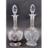 A pair of 19th century cut glass globe decanters complete with original stoppers, another small