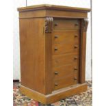 A small Victorian mahogany Wellington chest of six drawers with rocking mechanism, with acanthus