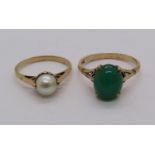 Two 9ct dress rings; a jadeite example and a pearl example, 4.1g total