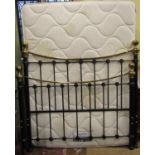 A Victorian style brass and iron 5ft bedstead complete with base springs and mattress