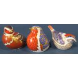 A collection of Royal Crown Derby ceramic ornaments to include a tortoise, a cockerel, three