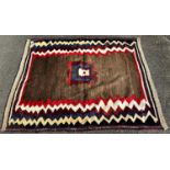 A North African Kilim eating mat with a zig-zag border , 130cm 130cm, together with a flat weave