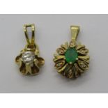 Two gem set 14ct pendants; a diamond solitaire example, 0.15ct approx and an emerald and diamond