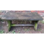 A rustic weathered oak or possibly elm occasional table with pegged stretcher, 91cm long x 42cm wide
