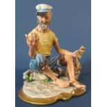 A Capodimonte figure of a sailor