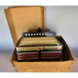A good condition, working Hohner Accordion with it’s original cardboard box.