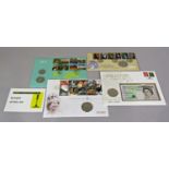 32 limited issue commemorative stamp/coin sets including 2009 Kew Gardens 50p, others containing £5,