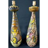 A vintage matched pair of large vase shaped studio pottery table lamps with all over hand painted