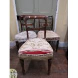 Three 19th century mahogany dining chairs with upholstered seats
