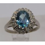 18ct white gold blue zircon and diamond oval cluster ring, size M, 4.3g