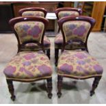 Set of four Victorian mahogany balloon back dining chairs with floral pattern upholstered seats