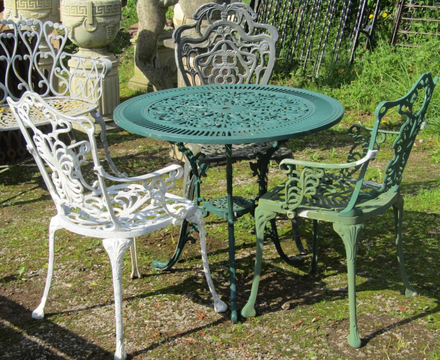 A green painted cast aluminium garden terrace table with decorative circular pierced top 80 cm