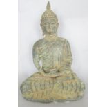 A South East Asian bronze Buddha meditating in the lotus position holding a cup 17cm tall.