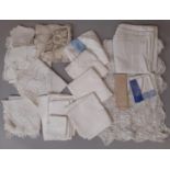 Small collection of white household linen including 4 bolster covers, napkins, table cloths with