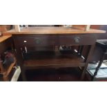 An Edwardian oak side table with two frieze drawers and under gallery, 120cm long