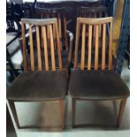 A set of six (4&2) G plan teakwood stick back dining chairs with upholstered seats