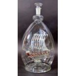 A Murano glass Viking Long Ship inside a blown glass bottle, 38 cm high, damage to some rigging, and