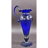 An elegant Bristol Blue Glass pitcher, 16cm high.