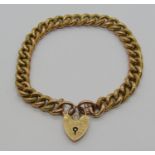 Antique 9ct curb link bracelet with textured links and engraved heart padlock clasp, maker 'W.J.