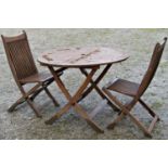 A stained hardwood circular folding garden terrace table with slatted top, 100 cm diameter