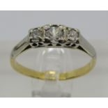 Antique three stone diamond ring in white and yellow metal, size N, 2.3g