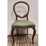 A set of six Victorian balloon back dining chairs with cabriole forelegs (stamped Edw winter)