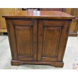 Good quality reproduction Georgian style low oak side cupboard enclosed by a pair of rectangular