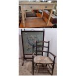 An Edwardian child's ladder back elbow chair with rush seat, and a stripped pine side table