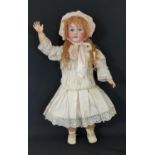 Early 20th century SFBJ bisque head character doll with jointed composition body, blue sleeping