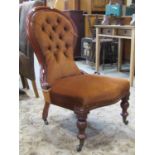 A Victorian mahogany drawing room chair with moulded show wood frame and serpentine seat