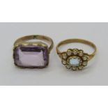 Two antique style 9ct gem set rings; an amethyst example, size K and a blue gem and seed pearl