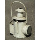 An old railway lamp with painted finish