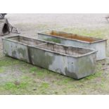 A vintage galvanised steel field water trough of rectangular form with pop riveted seams (af) 246 cm