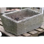 A weathered natural stone trough 67 cm long x 43 cm wide x 32 cm high (slightly tapered)