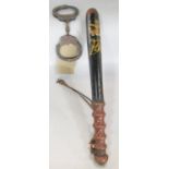 A Victorian wooden truncheon with painted crown and cypher VR, and leather wrist strap, 39cm, and