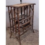 A Victorian bamboo Canterbury watnot on swept supports