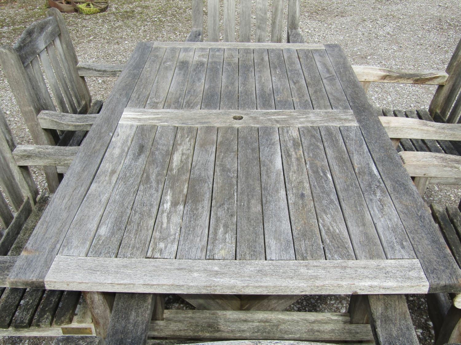 A Woodfurn heavy gauge weathered teak garden table with rectangular overhanging slatted panelled top - Image 2 of 3