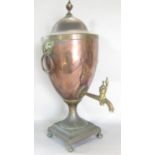 An elegant Regency brass and copper samovar with ram mask handles, 50cm high approx.