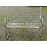 A weathered sprung steel two seat garden bench with strap work seat and scroll detail, 122 cm (4ft