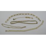 Group of 9ct chain jewellery comprising a heart link bracelet, a triple row bracelet (af) and