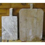 Two rustic pine outsized breadboards with a paint washed finish, the largest 80cm x 50cm