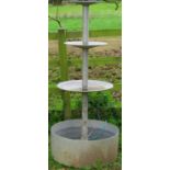 An aluminium garden water feature with graduated dished tiers 76 cm diameter (base) x 170 cm high