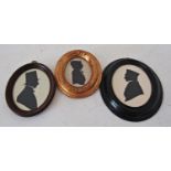 Three paper-cut silhouette portraits in profile, one labelled 'Charles Captain Cooch, nat. 1849,