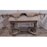 A traditional 19th century ash wood yoke, and a dry oak rectangular occasional table with baluster