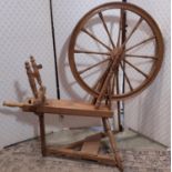 A traditional pine spinning wheel by Dryad handicrafts of Leicester