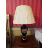 A pair of reproduction Georgian style urn shaped table lamps
