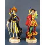 A collection of china figures comprising two masked Venetian carnival figures, an 18th century