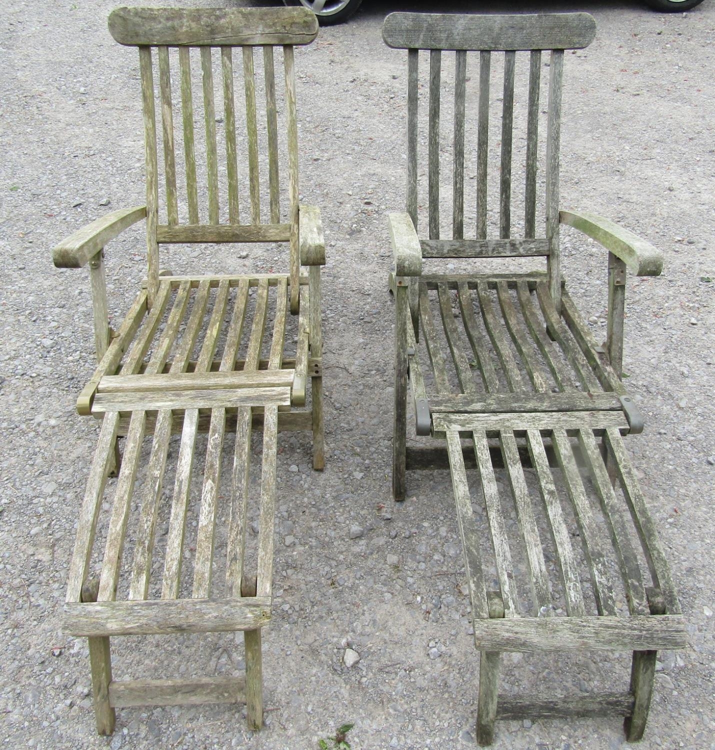 A pair of weathered teak folding garden steamer type lounge chairs with slatted seat, back and - Image 2 of 4