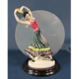 An art deco style table lamp with figure of a gypsy lady holding a pose, with glass panel shade, set